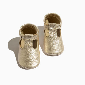 Platinum T-Bar Baby Shoe in soft leather, perfect for stylish and comfortable little feet.