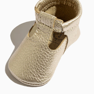 Platinum T-Bar Baby Shoe in angle view, stylish and comfortable for little feet. Perfect for early walkers.