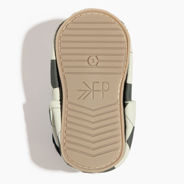 Playmaker Bow Baby Shoe in angle 5 view, featuring a stylish bow design and soft moccasin construction.