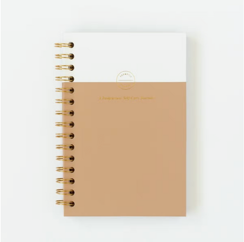 Coil-bound postpartum journal for new mothers, designed for recovery and reflection after childbirth.