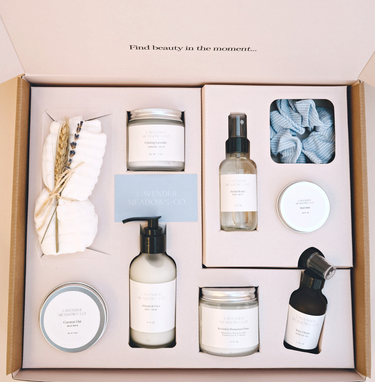 Deluxe postpartum care package gift set for new moms, featuring essential recovery items and pampering products.
