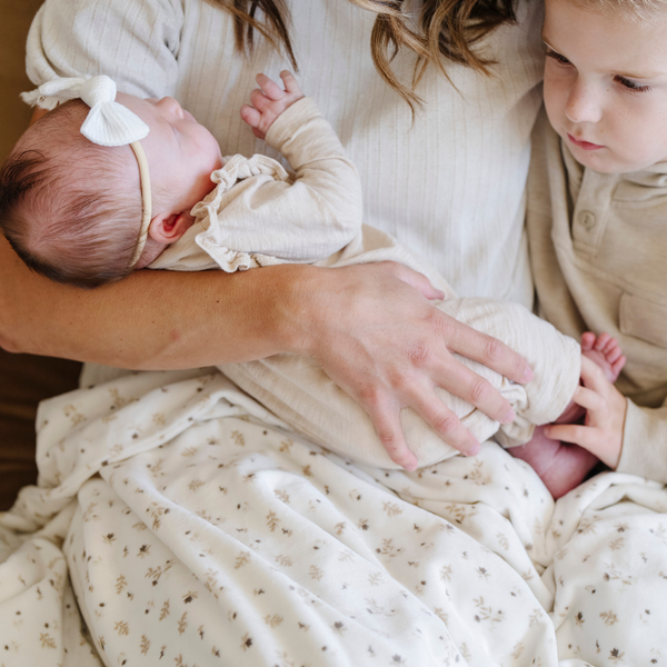 Minky stretch receiving blankets in a cozy angle, perfect for swaddling and keeping your baby warm.