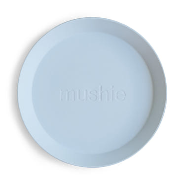 Round dinnerware plates for babies, perfect for mealtime with vibrant colors and safe materials.