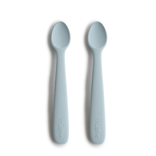 Silicone feeding spoons for babies, angled view showcasing soft, safe design for easy feeding.
