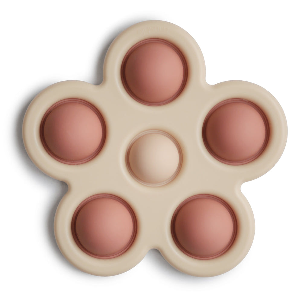 Colorful flower press toy for babies, promoting creativity and fine motor skills.