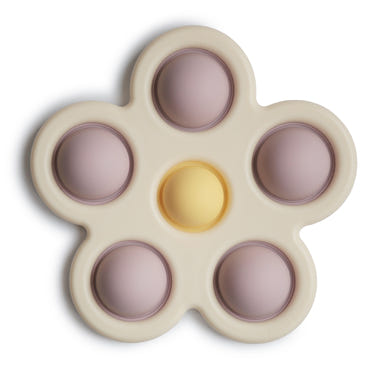 Colorful flower press toy for babies, promoting creativity and fine motor skills.