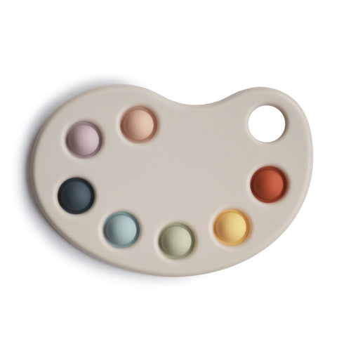 Colorful Paint Palette Press Toy for babies, promoting sensory play and fine motor skills development.