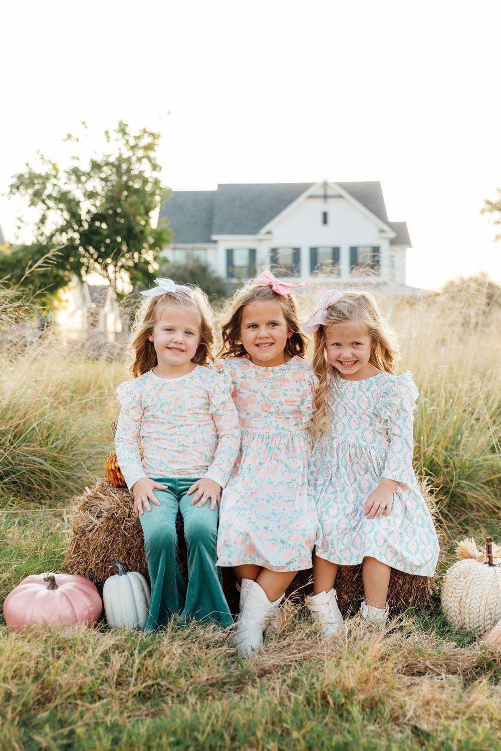 Pumpkin Kisses Harvest Wishes 3/4 Sleeve Ruffle Twirl Dress for babies, perfect for fall celebrations.