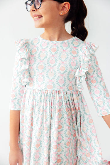Pumpkin Kisses Harvest Wishes 3/4 Sleeve Ruffle Twirl Dress for babies, perfect for fall celebrations.