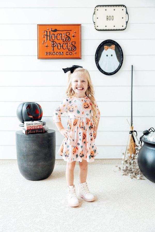 Pumpkin Peekaboo 3/4 Sleeve Twirl Dress with pockets, perfect for playful baby outfits.