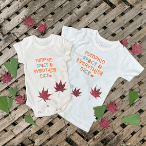 Short sleeve graphic bodysuit for babies featuring "Pumpkin Spice Nice" design, angle view 3.