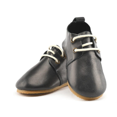 Black low top oxfords with hard sole for babies, stylish and comfortable footwear for little ones.