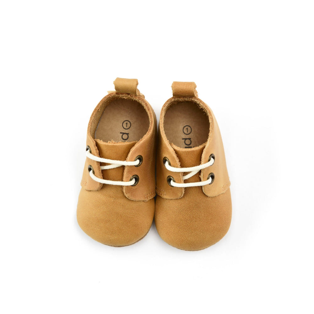 Natural Low Top Oxfords with soft sole for babies, perfect for comfort and style.