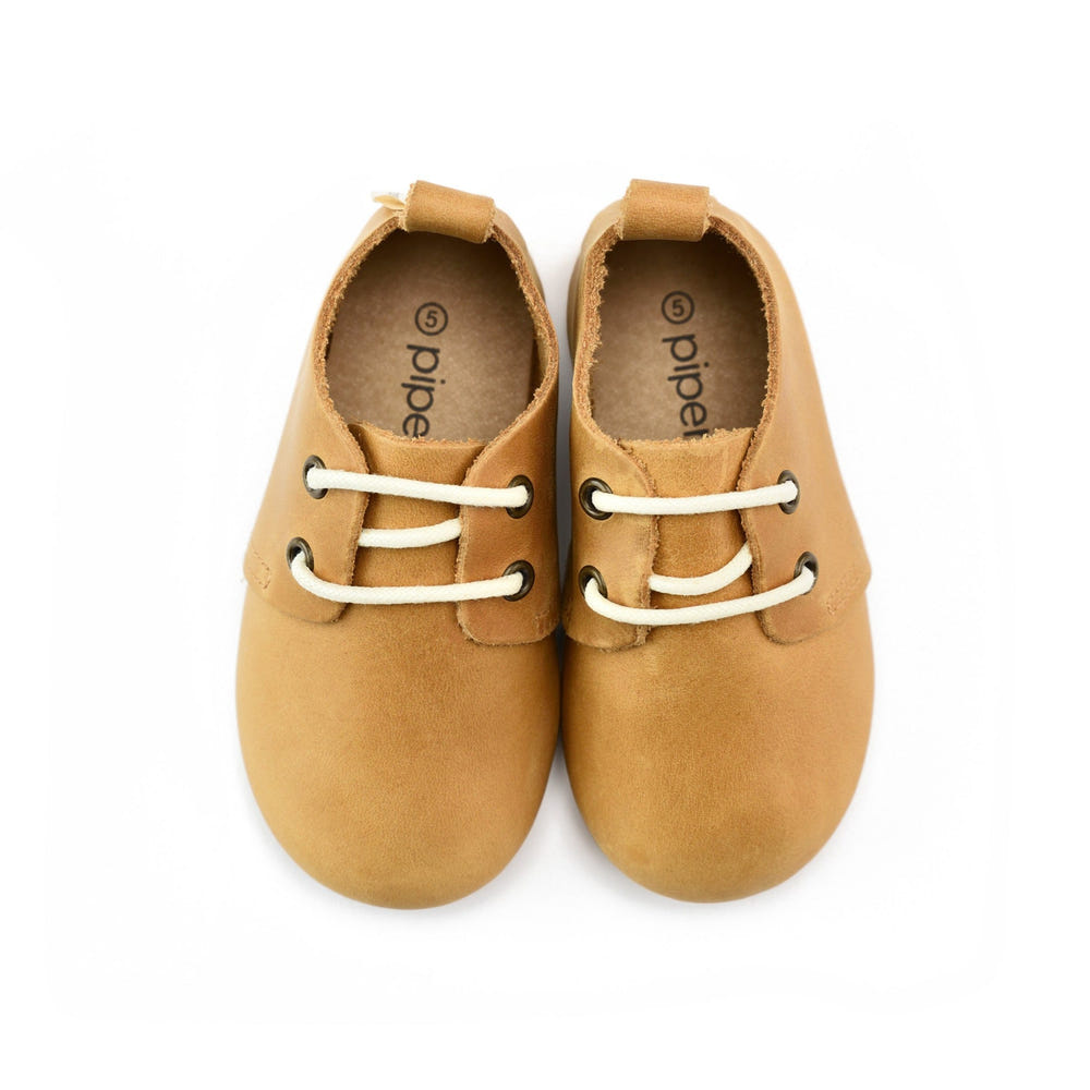 Natural low top oxfords for babies with hard sole, perfect for stylish and comfortable first steps.