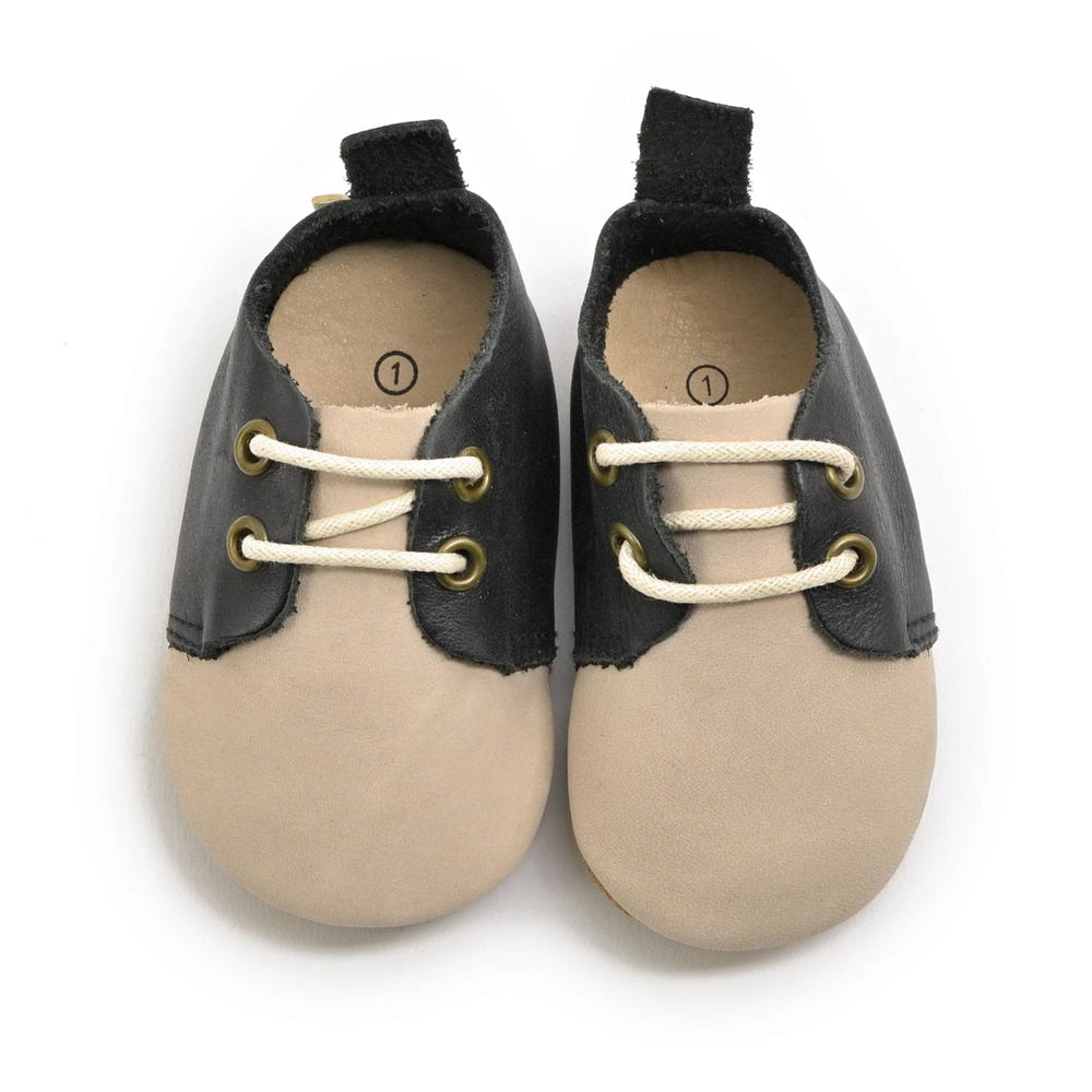 Soft sole low top oxfords for babies, perfect for comfort and style in every step.