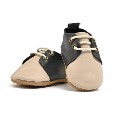Soft sole low top oxfords for babies, perfect for comfort and style in every step.