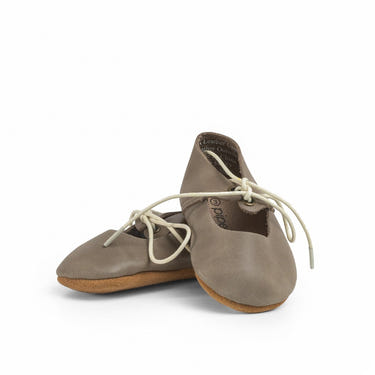 Soft sole lace-up Mary Jane shoes for babies in stone color, perfect for comfort and style.