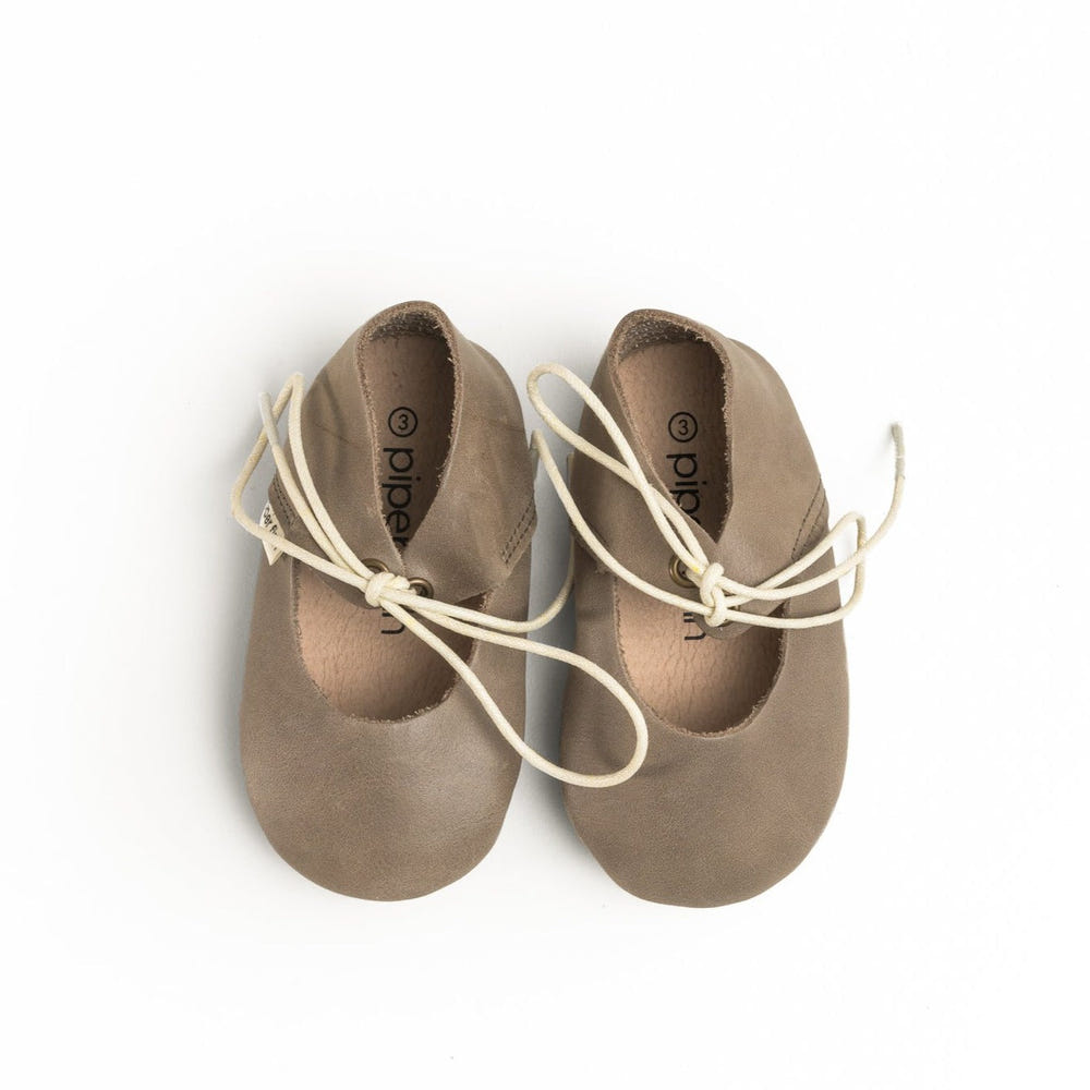 Soft sole lace-up Mary Jane shoes for babies in stone color, perfect for comfort and style.