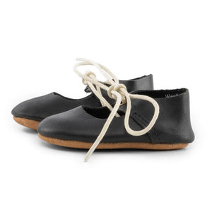 Black lace-up Mary Jane soft sole shoes for babies, angle view showcasing stylish design and comfort.