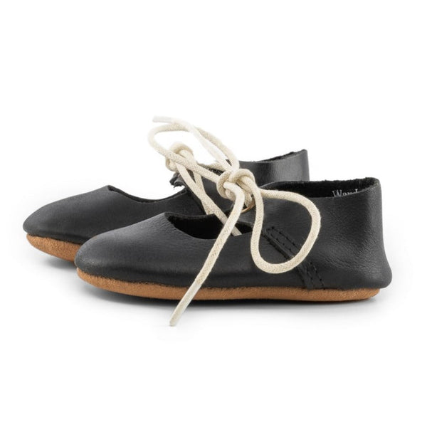 Black lace-up Mary Jane soft sole shoes for babies, angle view showcasing stylish design and comfort.