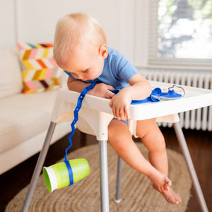 "Baby Bottle Bungee: Securely holds bottles for easy access and convenience during outings."