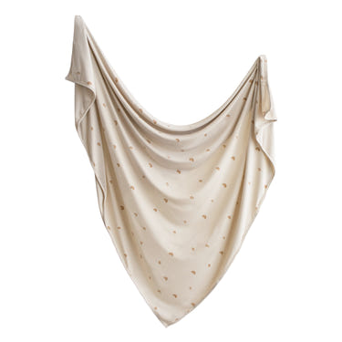 Soft stretchy swaddle for babies, ensuring comfort and security during sleep. Perfect for cozy naps and peaceful nights.
