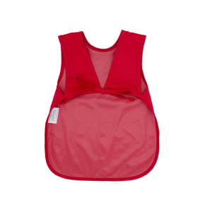 Solid candy apple red minimalist bapron for babies, angled view showcasing its stylish design and functionality.