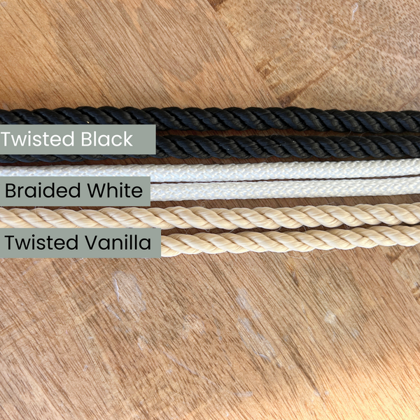 Outdoor high back baby swing in cream and black stripes, perfect for toddlers, shown at angle 7. Pre-order now!