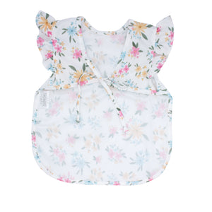 Pastel Floral Flutter Bapron for babies, featuring a charming floral design and flutter sleeves, angle view.