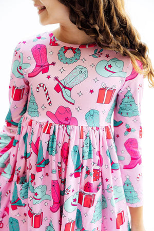 Christmas Cowgirl L/S Pocket Twirl Dress for babies, featuring a festive design and playful twirl style.
