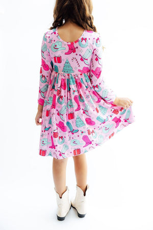 Christmas Cowgirl Long Sleeve Pocket Twirl Dress for babies, featuring a playful design and twirl-friendly skirt.
