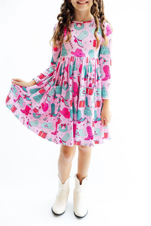 "Christmas Cowgirl L/S Pocket Twirl Dress for babies, featuring a fun twirl design and festive colors."