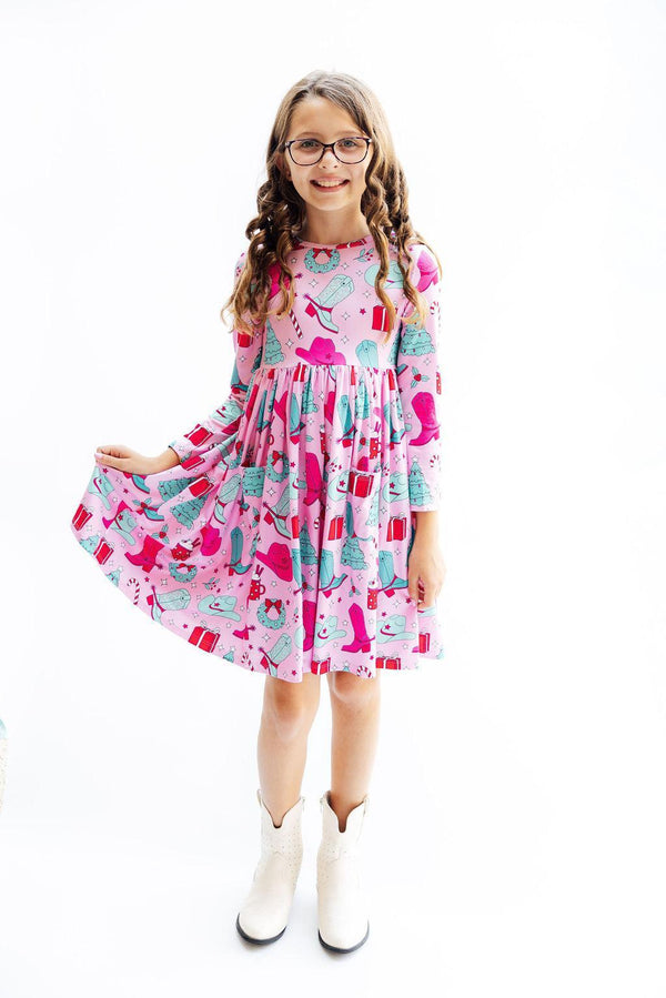 Christmas Cowgirl L/S Pocket Twirl Dress for babies, featuring a playful design and twirl-friendly skirt.