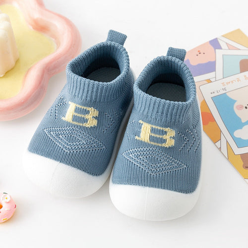 Baby "B" Sock Shoes in blue, perfect for little feet. Stylish and comfortable footwear for infants.