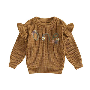 Baby girl birthday sweater with floral embroidery, long sleeve knitted pullover for infants, angle view.