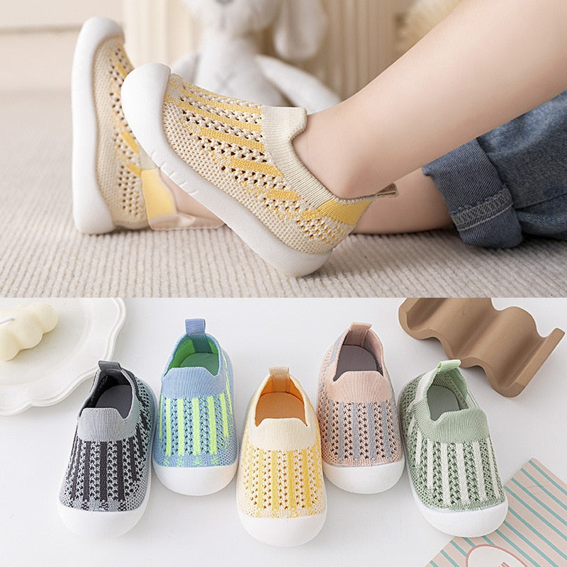 Yellow mix baby first walkers for infants, perfect for early steps and stylish comfort.