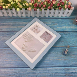 Wooden frame with DIY kit for souvenir footprints in clay
