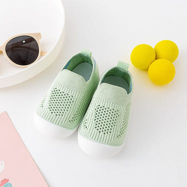 Green baby first walkers, perfect for little feet taking their first steps in style and comfort.