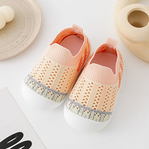 Pink striped baby first walkers, perfect for little ones taking their first steps. Shoes & booties for toddlers.