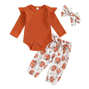 Baby girls' Halloween outfit set: ribbed romper, pumpkin print pants, and headband, perfect for festive celebrations.