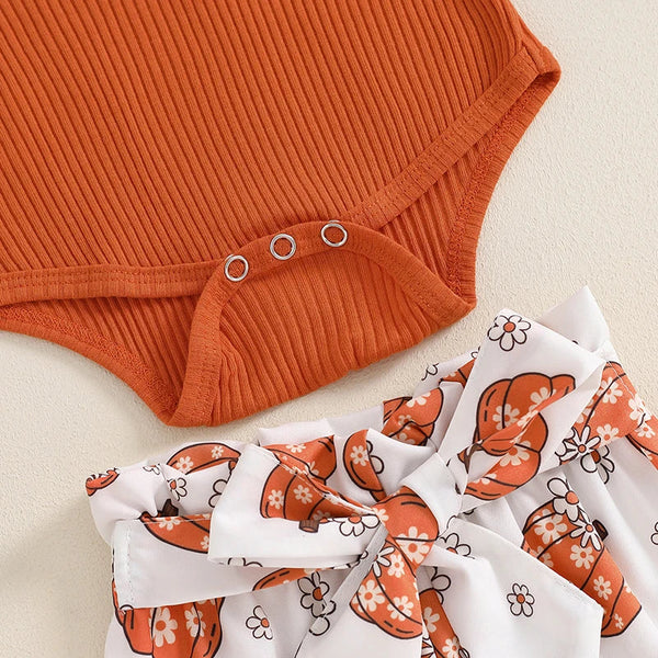Baby girls' Halloween outfit set: ribbed romper, pumpkin print pants, and headband, perfect for festive celebrations.