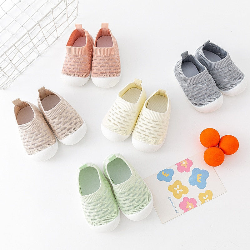 Khaki baby first walkers - soft, comfortable shoes for infants learning to walk. Perfect for little feet!