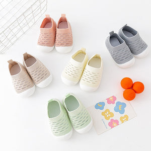 Khaki baby first walkers from angle 2, perfect for little feet taking their first steps.