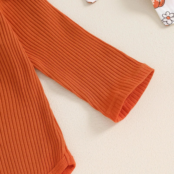 Baby girls' Halloween outfit set: ribbed romper, pumpkin print pants, and headband, perfect for festive celebrations.