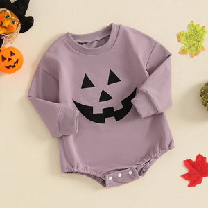 Baby Halloween romper with pumpkin face print for girls and boys, featuring long sleeves and round neck design.
