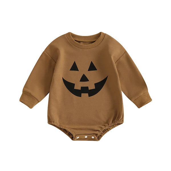 Baby Halloween romper with pumpkin face print, round neck, long sleeves for girls and boys, angle view.
