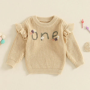 Baby girl birthday sweater with floral embroidery, long sleeve knitted pullover for infants, angle view.