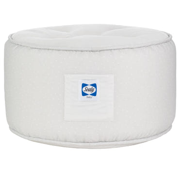 Sealy Pouf in Gray and Dot pattern - stylish and comfortable baby product for any nursery.