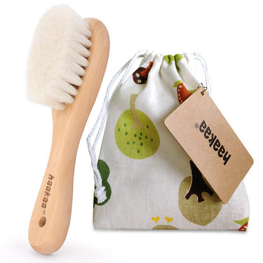 Haakaa Goats Wool Wooden Baby Hairbrush for gentle grooming and oral care, perfect for infants.