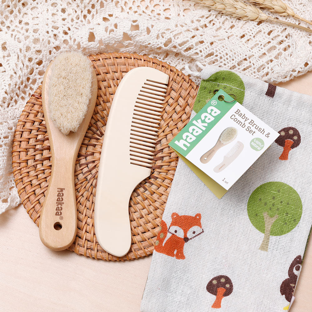 Haakaa Goats Wool Wooden Baby Brush & Comb Set for gentle grooming of your baby's hair and scalp.
